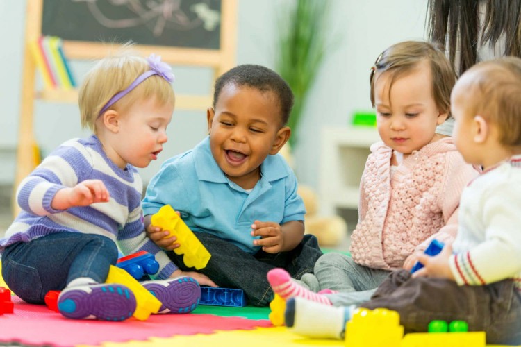 During early development children will laugh, squeal and scream during play.